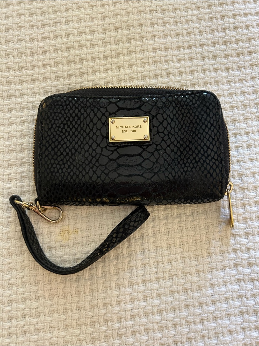 Michael Kors Black Snake-Embossed Patent Wristlet with Gold Plate